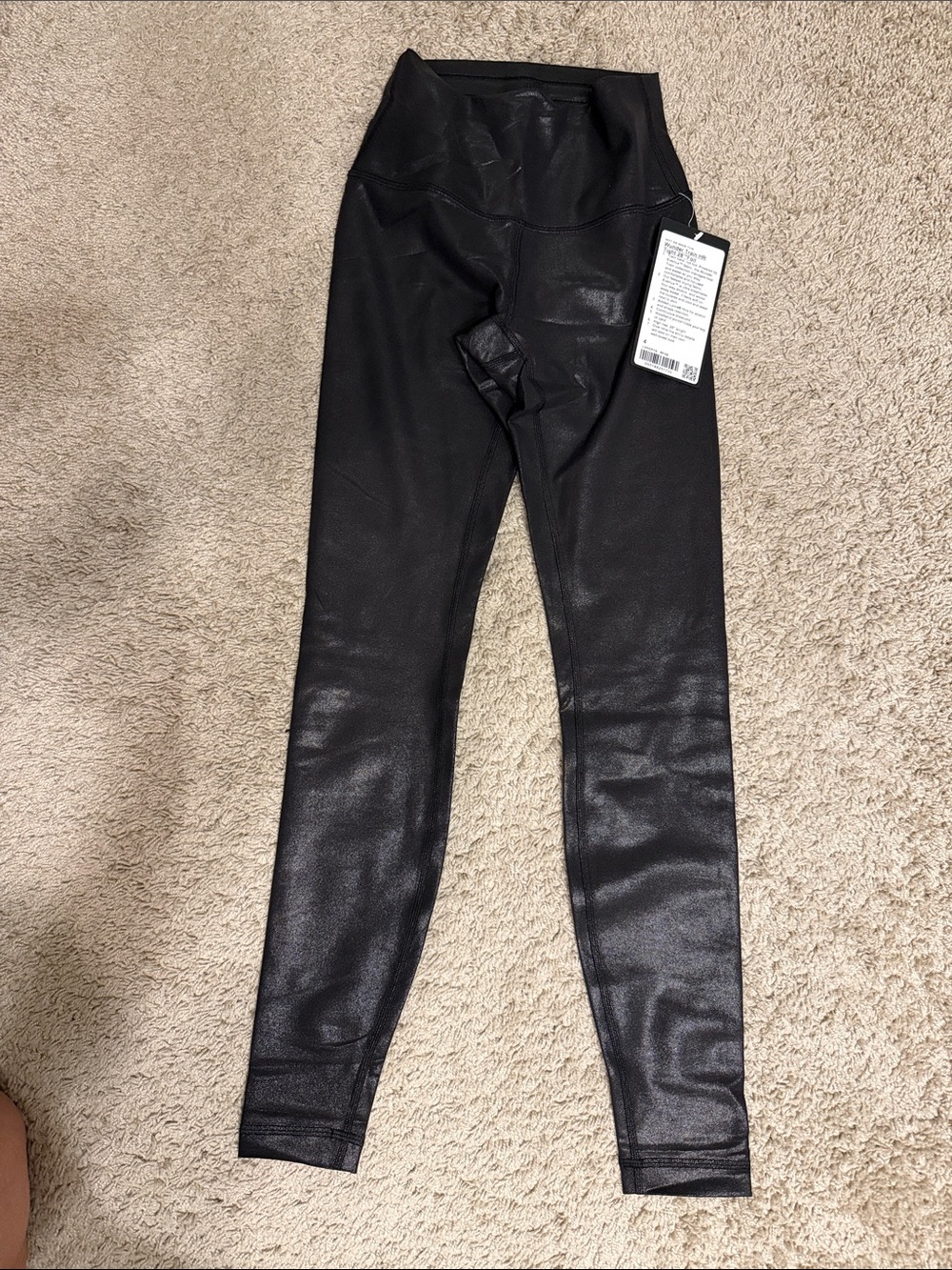 lululemon Wunder Train HR Tight 28” Foil size 4 (black). NWT. SOLD OUT